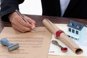 Firmare documento, casetta in legno