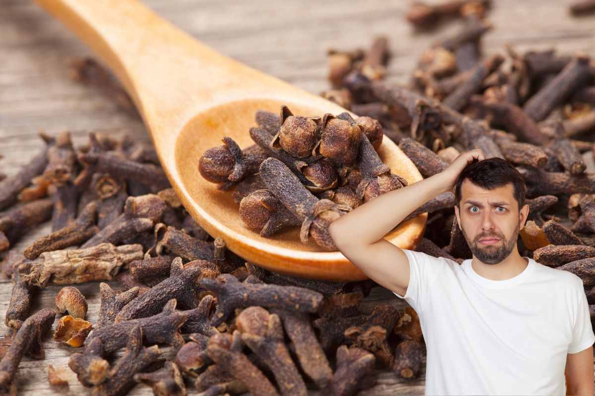 Chiodi di garofano con uomo allarmato