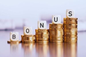 monete e scritta bonus sui dadi