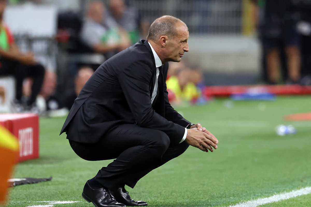 max allegri accovacciato