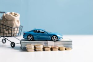 Auto, banconote, monete, carrello