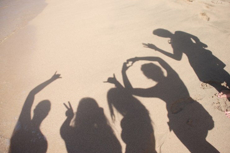 ombre persone sabbia